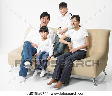 family, daytime, oriental, daughter, person, sofa, indoor View Large Photo Image Picture - family, daytime, oriental, daughter, person, sofa, indoor. Fotosearch