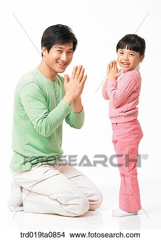 family, daytime, oriental, daughter, smile, person, indoor View Large Photo Image Picture - family, daytime, oriental, daughter, smile, person, indoor. Fotosearch