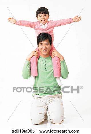 family, daytime, oriental, daughter, smile, person, indoor View Large Photo Image Stock Image - family, daytime, oriental, daughter, smile, person, indoor. Fotosearch