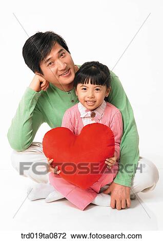 family, daytime, oriental, daughter, smile, person, indoor View Large Photo Image Stock Image - family, daytime, oriental, daughter, smile, person, indoor. Fotosearch