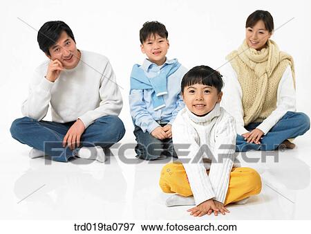 Stock Photo - family, daytime, oriental, daughter, muffler, person, indoor. Fotosearch