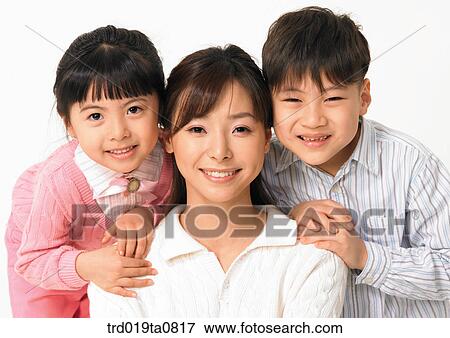 family, daytime, oriental, daughter, smile, person, indoor View Large Photo Image Stock Photo - family, daytime, oriental, daughter, smile, person, indoor. Fotosearch