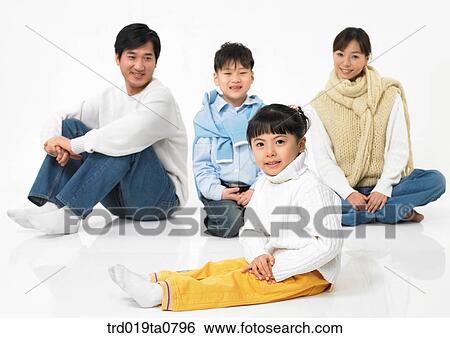 Stock Photograph - family, daytime, oriental, daughter, muffler, person, indoor. Fotosearch