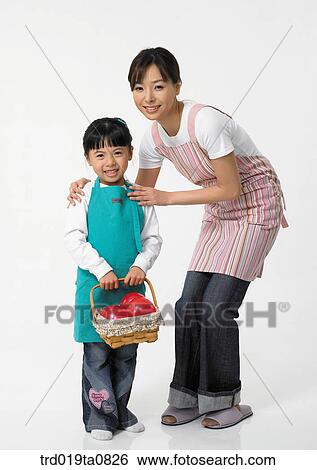 family, daytime, oriental, daughter, smile, wicker basket, person View Large Photo Image Stock Photograph - family, daytime, oriental, daughter, smile, wicker basket, person. Fotosearch