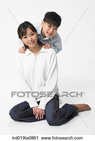 family, daytime, oriental, person, indoor, child View Large Photo Image Stock Image - family, daytime, oriental, person, indoor, child. Fotosearch