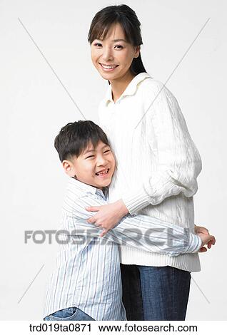 family, daytime, oriental, person, indoor, child View Large Photo Image Stock Image - family, daytime, oriental, person, indoor, child. Fotosearch