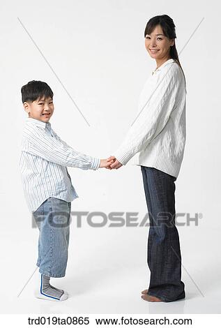 family, daytime, oriental, person, indoor, child View Large Photo Image Stock Photography - family, daytime, oriental, person, indoor, child. Fotosearch