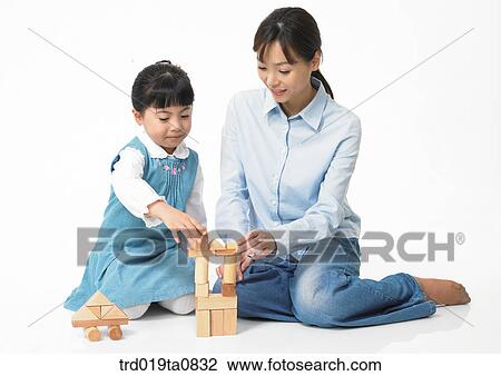 family, education, daytime, play, oriental, daughter, smile View Large Photo Image Stock Image - family, education, daytime, play, oriental, daughter, smile. Fotosearch