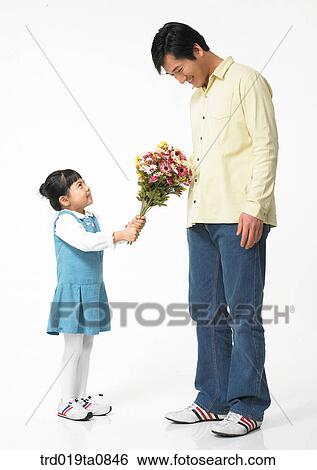 family, flower, flowerbunch, daytime, oriental, daughter, smile View Large Photo Image Stock Photograph - family, flower, flowerbunch, daytime, oriental, daughter, smile. Fotosearch