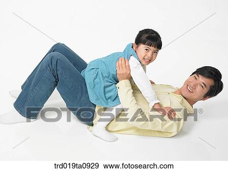 family, papa, father, person, daughter, indoor, smile View Large Photo Image Stock Photo - family, papa, father, person, daughter, indoor, smile. Fotosearch