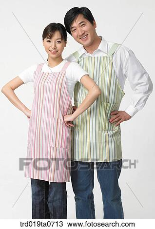 daytime, oriental, couple, person, indoor, apron View Large Photo Image Stock Image - daytime, oriental, couple, person, indoor, apron. Fotosearch