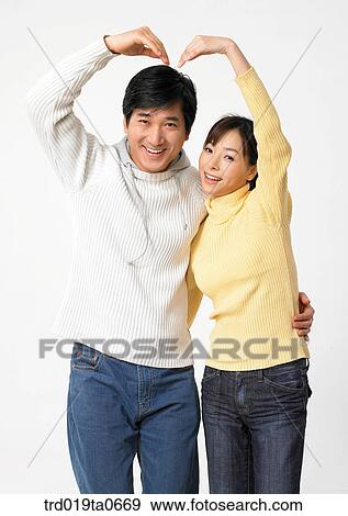 daytime, oriental, couple, person, indoor, woman View Large Photo Image Stock Photo - daytime, oriental, couple, person, indoor, woman. Fotosearch