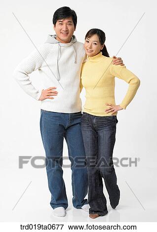 Stock Photo - daytime, oriental, couple, person, indoor, woman. Fotosearch