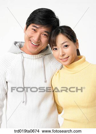 Picture - daytime, oriental, smile, couple, person, indoor. Fotosearch