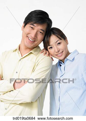 daytime, oriental, smile, couple, person, indoor View Large Photo Image Picture - daytime, oriental, smile, couple, person, indoor. Fotosearch