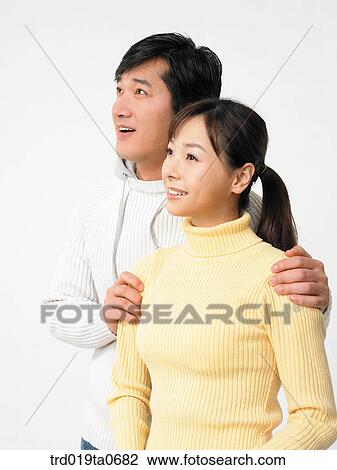 daytime, oriental, smile, couple, person, indoor View Large Photo Image Stock Image - daytime, oriental, smile, couple, person, indoor. Fotosearch