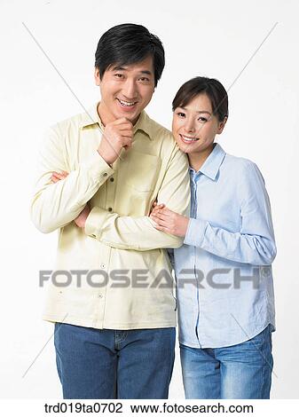 daytime, oriental, smile, couple, person, indoor View Large Photo Image Stock Image - daytime, oriental, smile, couple, person, indoor. Fotosearch