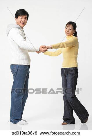 daytime, oriental, smile, couple, person, indoor View Large Photo Image Stock Photo - daytime, oriental, smile, couple, person, indoor. Fotosearch