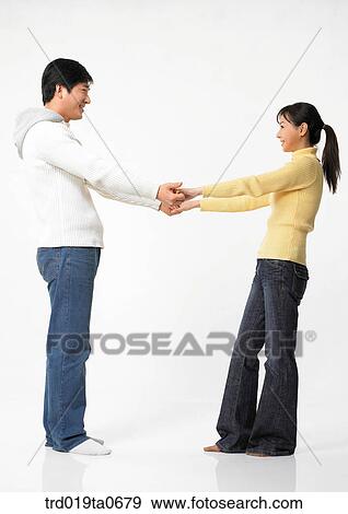 daytime, oriental, smile, couple, person, indoor View Large Photo Image Stock Photo - daytime, oriental, smile, couple, person, indoor. Fotosearch