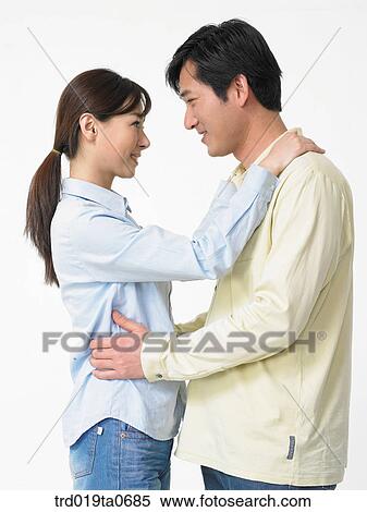 daytime, oriental, smile, couple, person, indoor View Large Photo Image Stock Photography - daytime, oriental, smile, couple, person, indoor. Fotosearch