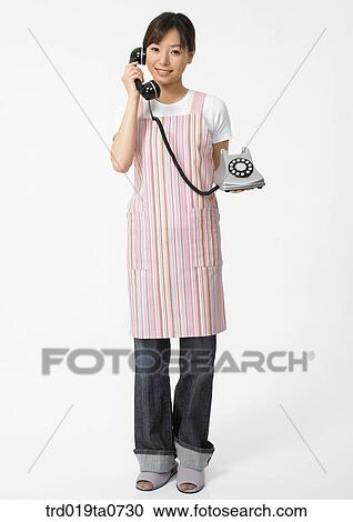 daytime, oriental, smile, person, indoor, apron, woman View Large Photo Image Stock Image - daytime, oriental, smile, person, indoor, apron, woman. Fotosearch