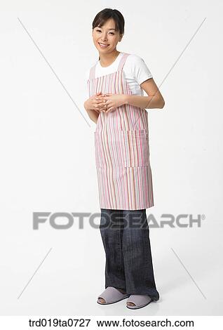 daytime, oriental, smile, person, indoor, apron, woman View Large Photo Image Stock Photo - daytime, oriental, smile, person, indoor, apron, woman. Fotosearch