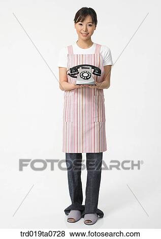 daytime, oriental, smile, person, indoor, apron, woman View Large Photo Image Stock Photo - daytime, oriental, smile, person, indoor, apron, woman. Fotosearch