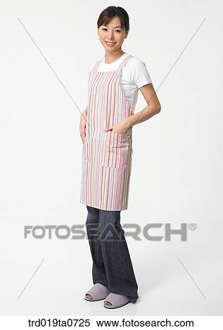daytime, oriental, smile, person, indoor, apron, woman View Large Photo Image Stock Photography - daytime, oriental, smile, person, indoor, apron, woman. Fotosearch