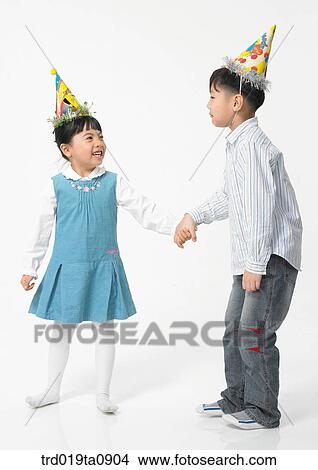 Picture - family, brother and sister, daytime, oriental, smile, person, birthday. Fotosearch
