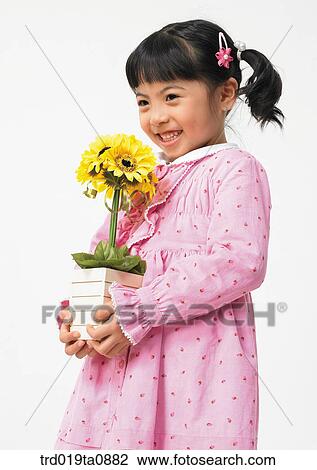 flower, daytime, oriental, smile, person, indoor, child View Large Photo Image Stock Image - flower, daytime, oriental, smile, person, indoor, child. Fotosearch