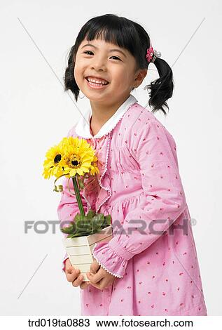 flower, daytime, oriental, smile, person, indoor, child View Large Photo Image Stock Image - flower, daytime, oriental, smile, person, indoor, child. Fotosearch