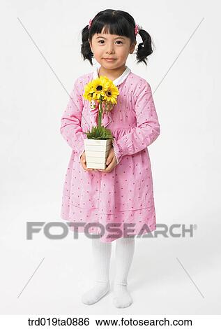 flower, daytime, oriental, smile, person, indoor, child View Large Photo Image Stock Photograph - flower, daytime, oriental, smile, person, indoor, child. Fotosearch