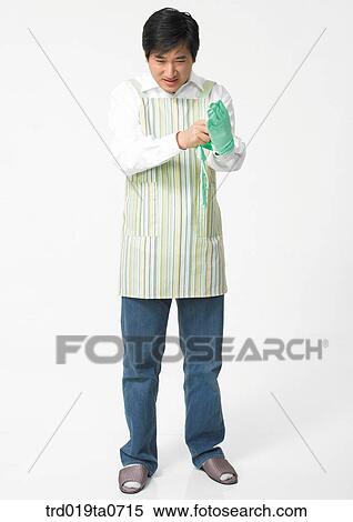 pair of rubber gloves, daytime, oriental, person, indoor, apron View Large Photo Image Stock Photography - pair of rubber gloves, daytime, oriental, person, indoor, apron. Fotosearch
