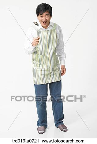 pair of rubber gloves, ladle, daytime, oriental, person, indoor View Large Photo Image Stock Image - pair of rubber gloves, ladle, daytime, oriental, person, indoor. Fotosearch
