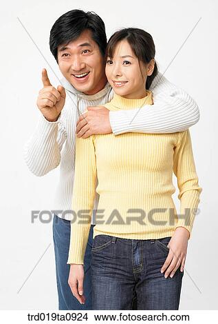 woman, daytime, oriental, smile, couple, person View Large Photo Image Picture - woman, daytime, oriental, smile, couple, person. Fotosearch