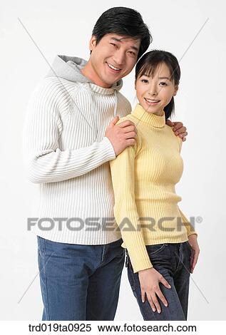 Stock Photography - woman, daytime, oriental, smile, couple, person. Fotosearch