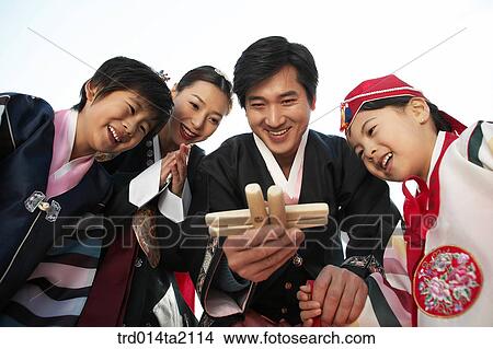 festival day, New Year's Day, Korean clothes, tradition, clothes, harvest festival, outdoor View Large Photo Image Picture - festival day, New Year's Day, Korean clothes, tradition, clothes, harvest festival, outdoor. Fotosearch