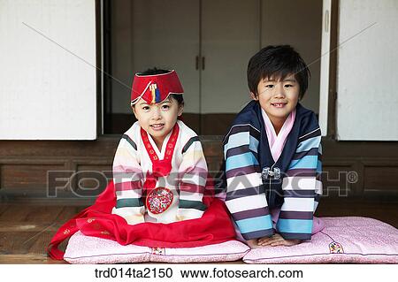 Stock Image - festival day, New Year's Day, Korean clothes, tradition, clothes, harvest festival, outdoor. Fotosearch