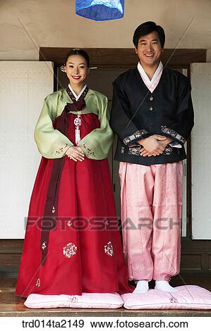 Stock Photo - festival day, New Year's Day, Korean clothes, tradition, clothes, harvest festival, outdoor. Fotosearch