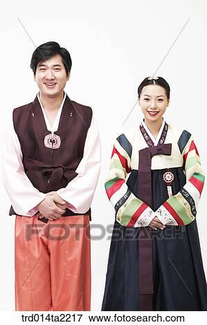 Stock Photo - festival day, New Year's Day, Korean clothes, tradition, clothes, harvest festival, person. Fotosearch