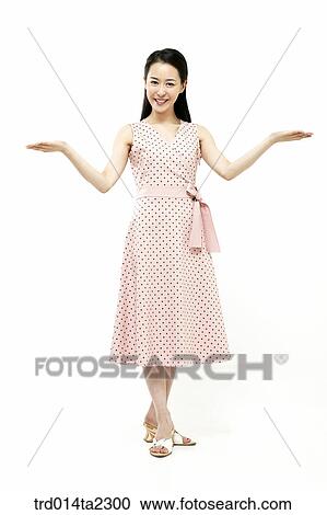 Stock Image - person, oriental, Korean, Asian, woman, indoor, daytime. Fotosearch