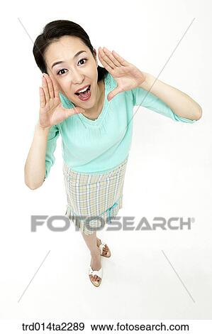 Stock Photo - person, oriental, Korean, Asian, woman, indoor, daytime. Fotosearch