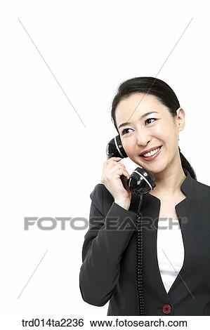 Stock Photograph - person, oriental, Korean, Asian, woman, indoor, daytime. Fotosearch