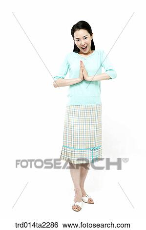 Stock Photograph - person, oriental, Korean, Asian, woman, indoor, daytime. Fotosearch