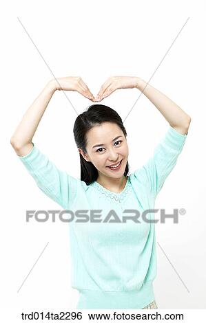Stock Photograph - person, oriental, Korean, Asian, woman, indoor, daytime. Fotosearch