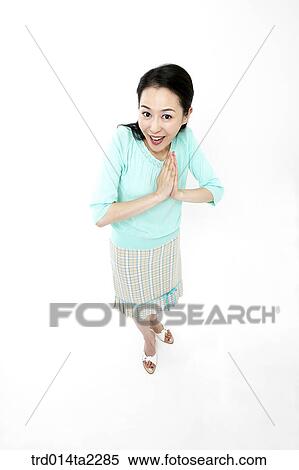 Stock Photography - person, oriental, Korean, Asian, woman, indoor, daytime. Fotosearch