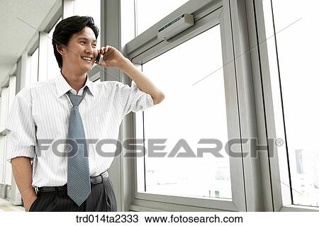 Stock Image - person, oriental, Korean, Asian, indoor, daytime. Fotosearch