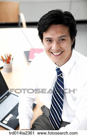 Stock Image - person, oriental, Korean, Asian, indoor, daytime. Fotosearch