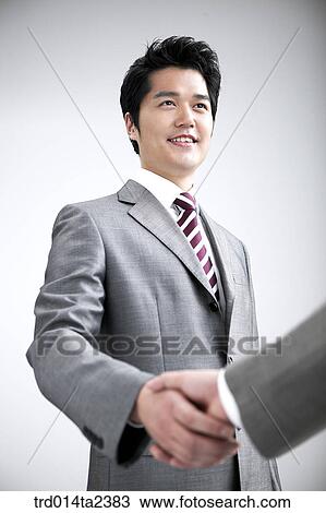 Stock Image - person, oriental, Korean, Asian, indoor, daytime. Fotosearch