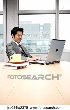 Stock Photo - person, oriental, Korean, Asian, indoor, daytime. Fotosearch